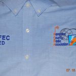 Woven Button down includes club logo, call and name
