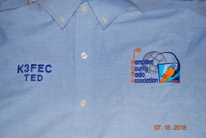 Woven Button down includes club logo, call and name
